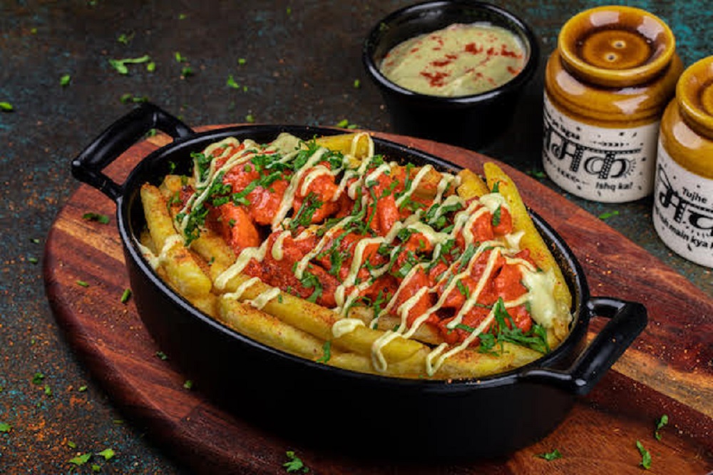 Enjoy Dubai’s First Loaded Butter Chicken  Fries At  Indian Slider Hidden Gem O’Pao