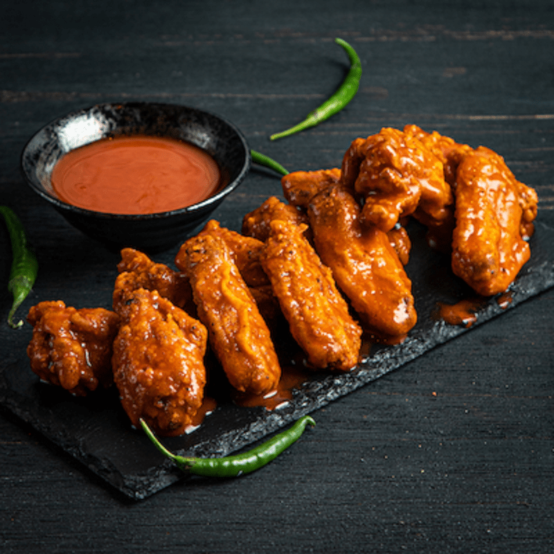 All You Can Eat Wings with Soft Drinks at AED 38 at SFC Plus